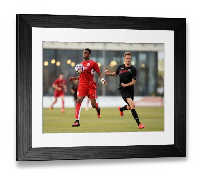 Framed Print : Battling for Supremacy: Kodjia vs. Bochniewicz in Granada vs. Bristol City Pre-Season Clash Framed Print : Battling for Supremacy: Kodjia vs. Bochniewicz in Granada vs. Bristol City Pre-Season Clash