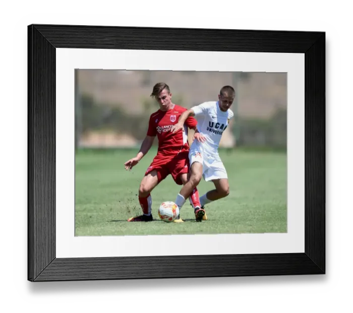 Framed Print : Bristol City's Joe Bryan in Action: Battling for the Ball at La Manga Training Ground Framed Print : Bristol City's Joe Bryan in Action: Battling for the Ball at La Manga Training Ground