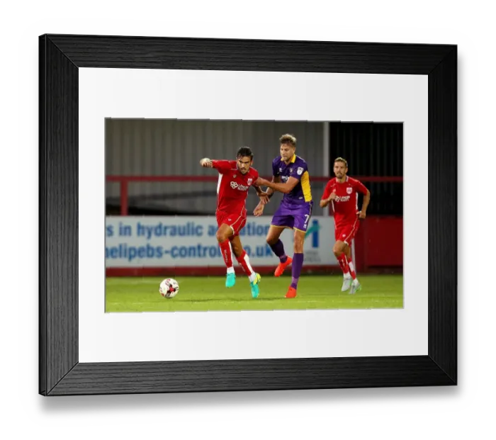 Framed Print : Marlon Pack Surges Past Harry Pell: Cheltenham Town vs. Bristol City Preseason Clash Framed Print : Marlon Pack Surges Past Harry Pell: Cheltenham Town vs. Bristol City Preseason Clash