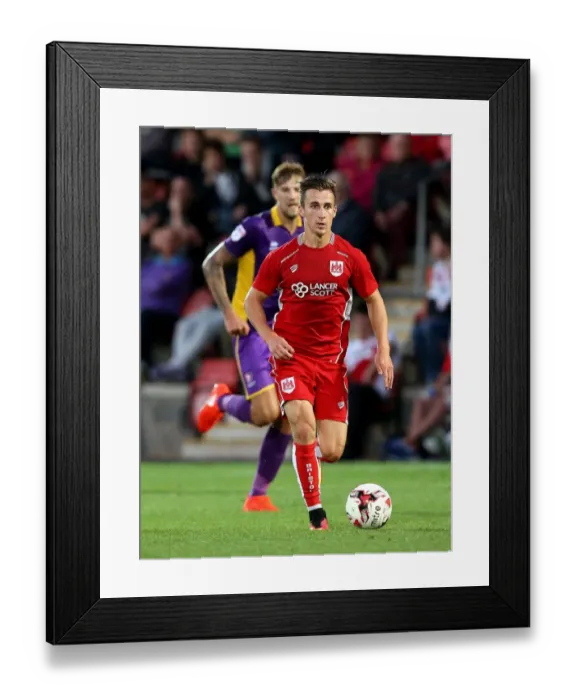 Framed Print : Bristol City's Joe Bryan Scores Past Cheltenham Town Goalkeeper in Preseason Friendly Framed Print : Bristol City's Joe Bryan Scores Past Cheltenham Town Goalkeeper in Preseason Friendly