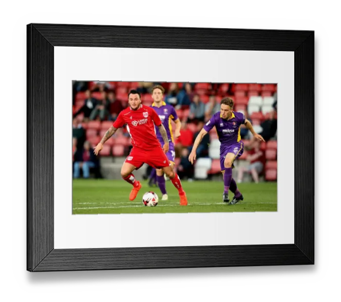 Framed Print : Bristol City's Lee Tomlin Scores Past Cheltenham Town's Daniel Parslow - Preseason Friendly, 2016 Framed Print : Bristol City's Lee Tomlin Scores Past Cheltenham Town's Daniel Parslow - Preseason Friendly, 2016
