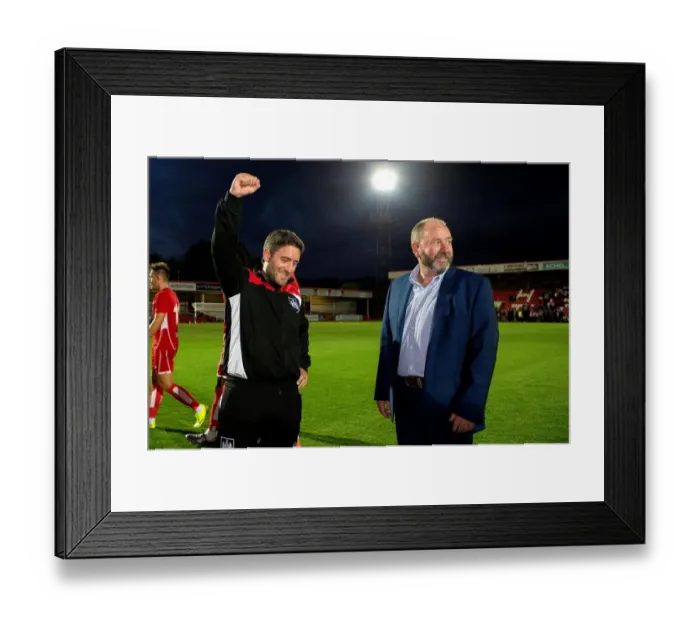 Framed Print : Johnson vs. Johnson: Lee Celebrates Victory Over Father Gary After Bristol City's Win Against Cheltenham Town