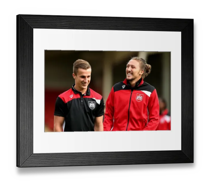 Framed Print : Bristol City Players Joe Bryan and Luke Ayling Smile at Abbey Business Stadium Ahead of Preseason Friendly vs Cheltenham Town Framed Print : Bristol City Players Joe Bryan and Luke Ayling Smile at Abbey Business Stadium Ahead of Preseason Friendly vs Cheltenham Town