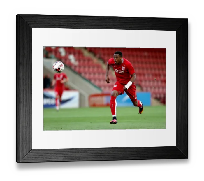 Framed Print : Bristol City's Kodjia Chases Down the Ball in Preseason Clash against Cheltenham Town Framed Print : Bristol City's Kodjia Chases Down the Ball in Preseason Clash against Cheltenham Town