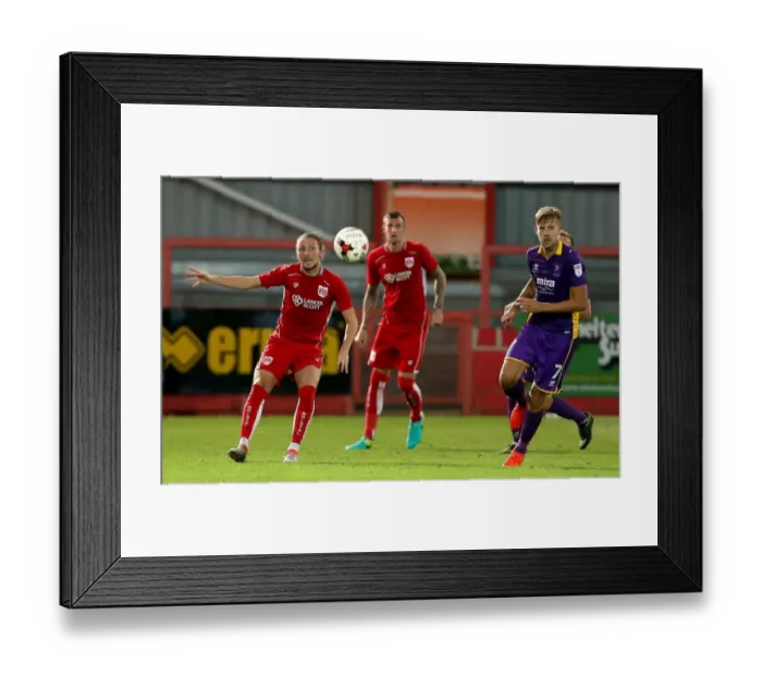 Framed Print : Bristol City's Luke Ayling Plays a Pass Forward in Preseason Friendly Against Cheltenham Town Framed Print : Bristol City's Luke Ayling Plays a Pass Forward in Preseason Friendly Against Cheltenham Town