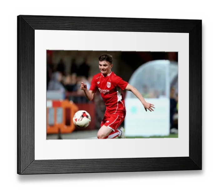 Framed Print : Bristol City's Jonny Smith Scores Past Cheltenham Town Defenders in Preseason Friendly Framed Print : Bristol City's Jonny Smith Scores Past Cheltenham Town Defenders in Preseason Friendly