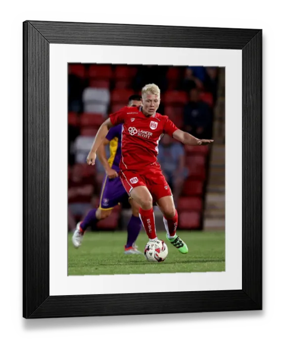 Framed Print : Bristol City's George Dowling Charges Forward in Preseason Friendly Against Cheltenham Town Framed Print : Bristol City's George Dowling Charges Forward in Preseason Friendly Against Cheltenham Town