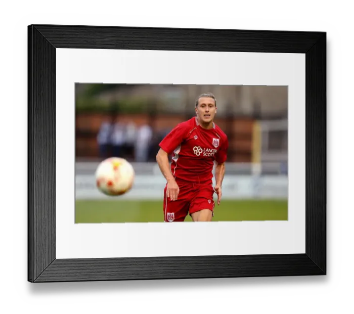 Framed Print : Bristol City's Luke Freeman Chases Down the Ball in Pre-Season Friendly Against Bath City