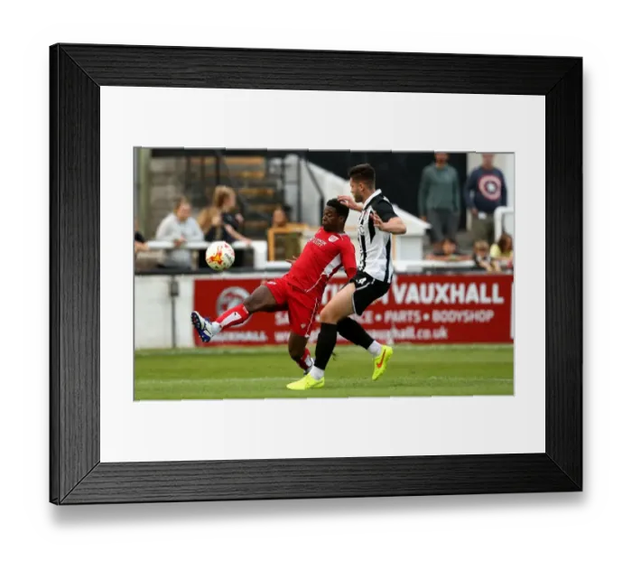 Framed Print : Kieran Agard Breezes Past Bath City's Jack Batten: Pre-Season Friendly Clash at Twerton Park Framed Print : Kieran Agard Breezes Past Bath City's Jack Batten: Pre-Season Friendly Clash at Twerton Park