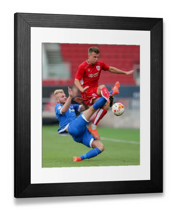 Framed Print : Bristol City's Joe Bryan Tackled by Portsmouth's Jack Whatmough during Pre-Season Friendly