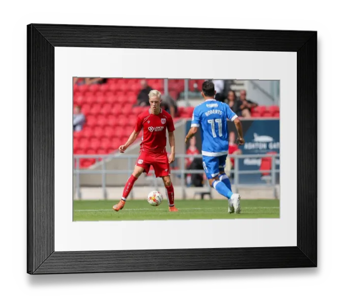 Framed Print : Hordur Magnusson vs Gary Roberts: Intense Clash at Ashton Gate - Bristol City vs Portsmouth Pre-Season Friendly Framed Print : Hordur Magnusson vs Gary Roberts: Intense Clash at Ashton Gate - Bristol City vs Portsmouth Pre-Season Friendly