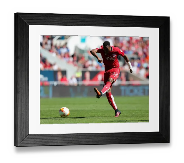 Framed Print : Bristol City's Jonathan Kodjia Fires A Shot Against Wigan Athletic at Ashton Gate Stadium Framed Print : Bristol City's Jonathan Kodjia Fires A Shot Against Wigan Athletic at Ashton Gate Stadium