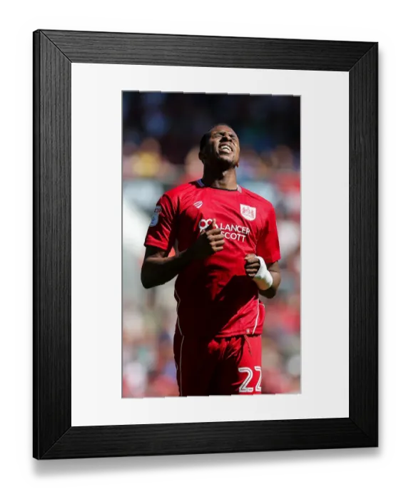 Framed Print : Bristol City's Kodjia Displays Frustration Against Wigan Athletic Framed Print : Bristol City's Kodjia Displays Frustration Against Wigan Athletic