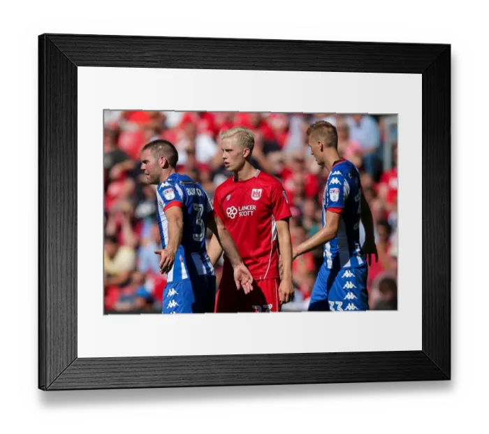 Framed Print : Bristol City vs Wigan Athletic: Hordur Magnusson's Intense Focus at Ashton Gate Stadium Framed Print : Bristol City vs Wigan Athletic: Hordur Magnusson's Intense Focus at Ashton Gate Stadium
