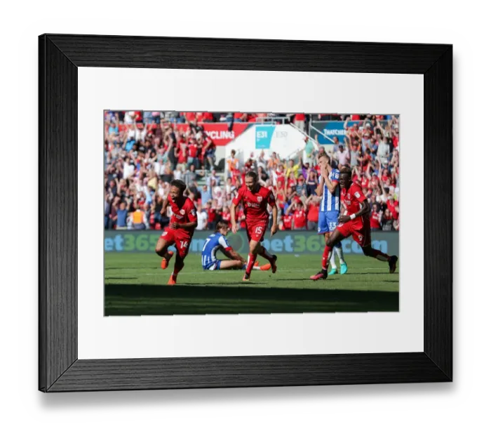 Framed Print : Bobby Reid's Stunner: 2-1 Lead for Bristol City Against Wigan Athletic at Ashton Gate Framed Print : Bobby Reid's Stunner: 2-1 Lead for Bristol City Against Wigan Athletic at Ashton Gate