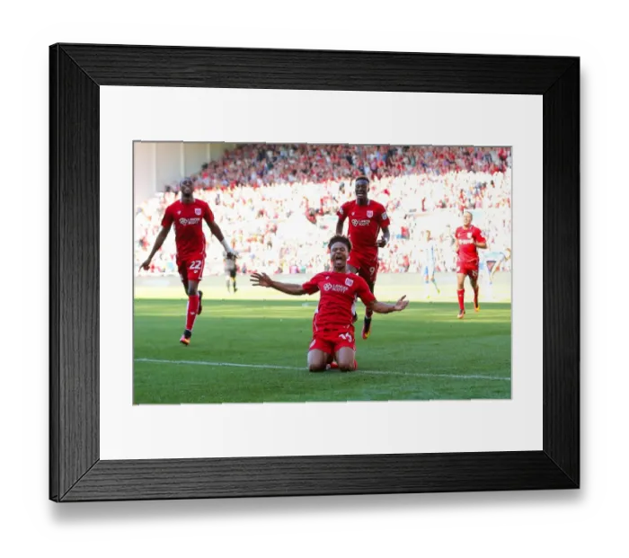 Framed Print : Bristol City's Bobby Reid Scores Dramatic 2-1 Goal Against Wigan Athletic Framed Print : Bristol City's Bobby Reid Scores Dramatic 2-1 Goal Against Wigan Athletic