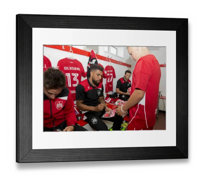 Framed Print : Scott Golbourne of Bristol City Signs Autograph for Mascot in Changing Room during Bristol City v Wigan Athletic Match Framed Print : Scott Golbourne of Bristol City Signs Autograph for Mascot in Changing Room during Bristol City v Wigan Athletic Match