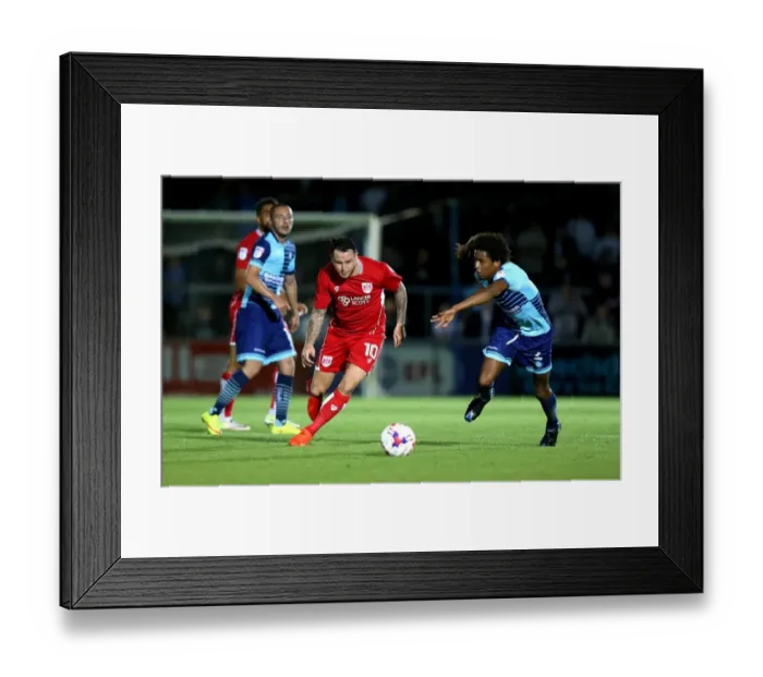 Framed Print : Bristol City's Lee Tomlin Dashes Past Wycombe Wanderers Sido Jombati in EFL League Cup Clash Framed Print : Bristol City's Lee Tomlin Dashes Past Wycombe Wanderers Sido Jombati in EFL League Cup Clash
