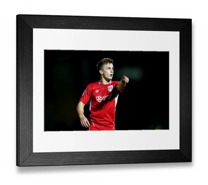Framed Print : Bristol City's Joe Bryan Points the Way in EFL Cup Clash Against Wycombe Wanderers Framed Print : Bristol City's Joe Bryan Points the Way in EFL Cup Clash Against Wycombe Wanderers