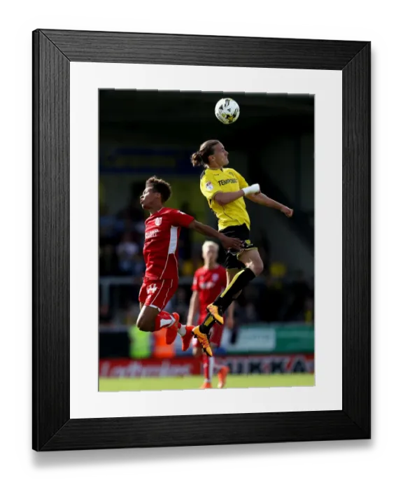 Framed Print : Bobby Reid vs Jackson Irvine: Heading Battle at Pirelli Stadium - Burton Albion vs Bristol City, Sky Bet Championship Framed Print : Bobby Reid vs Jackson Irvine: Heading Battle at Pirelli Stadium - Burton Albion vs Bristol City, Sky Bet Championship