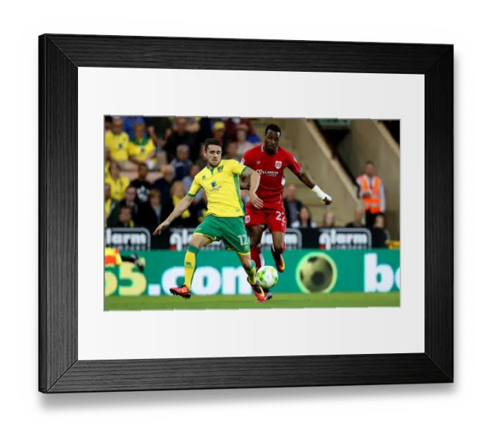 Framed Print : Clash at Carrow Road: Kodjia vs. Brady, Norwich City vs. Bristol City, Sky Bet Championship Framed Print : Clash at Carrow Road: Kodjia vs. Brady, Norwich City vs. Bristol City, Sky Bet Championship