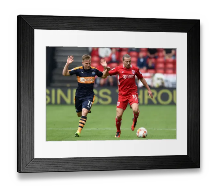 Framed Print : Bristol City vs Newcastle United: A Battle for Ball Possession - Freeman vs Ritchie Framed Print : Bristol City vs Newcastle United: A Battle for Ball Possession - Freeman vs Ritchie