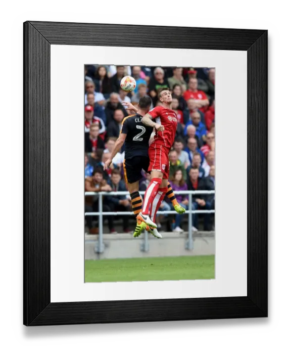 Framed Print : Battling for Supremacy: Aden Flint vs. Ciaran Clark in the Sky Bet Championship Clash between Bristol City and Newcastle United