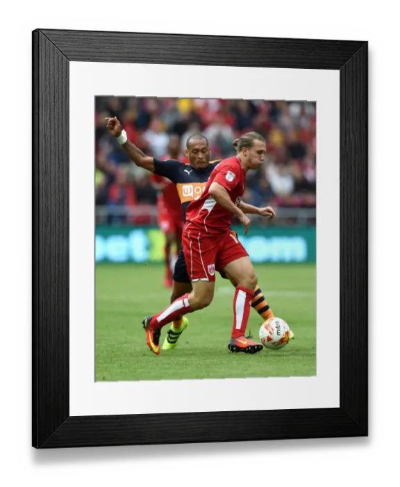 Framed Print : Battling for Supremacy: Luke Freeman vs. Yoan Gouffran in the 2016 Championship Clash between Bristol City and Newcastle United