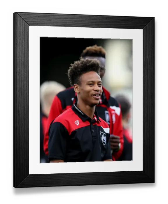 Framed Print : Bobby Reid's Smile: Bristol City's Arrival at Glanford Park for EFL Cup Clash with Scunthorpe United