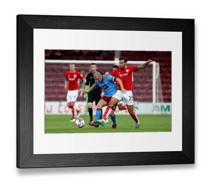 Framed Print : Marlon Pack Tackles Stephen Dawson: Intense Moment from Scunthorpe United vs. Bristol City EFL Cup Clash Framed Print : Marlon Pack Tackles Stephen Dawson: Intense Moment from Scunthorpe United vs. Bristol City EFL Cup Clash