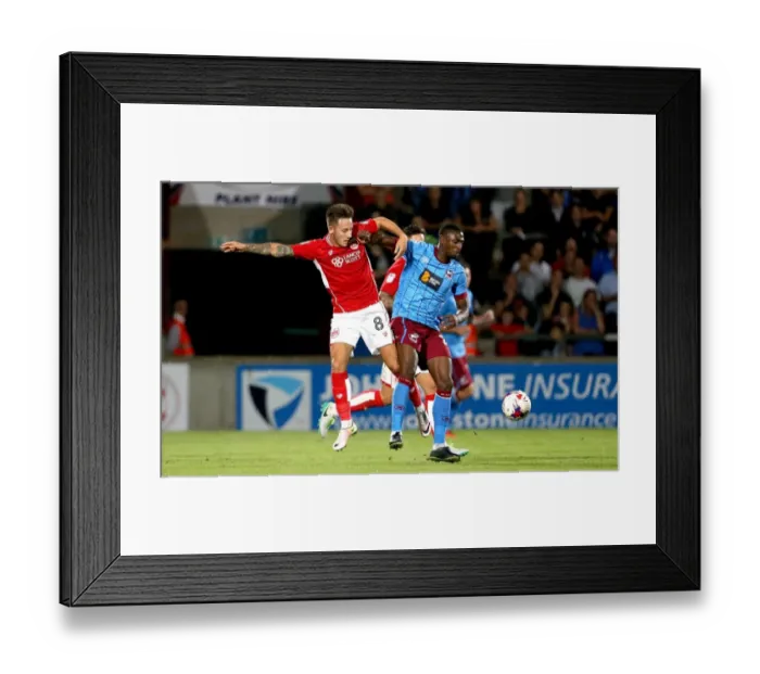 Framed Print : Bristol City's Josh Brownhill Tackles Hakeeb Adelakun in EFL Cup Clash at Scunthorpe United