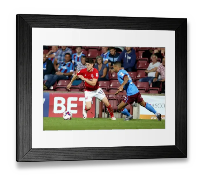 Framed Print : Bristol City's Callum O'Dowda Breezes Past Scunthorpe's Jordan Clarke in EFL Cup Clash Framed Print : Bristol City's Callum O'Dowda Breezes Past Scunthorpe's Jordan Clarke in EFL Cup Clash