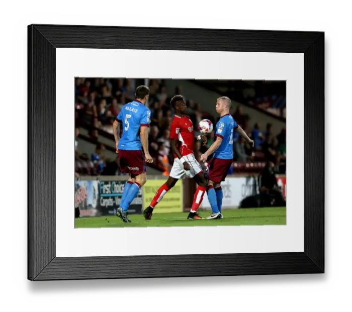 Framed Print : Tammy Abraham vs Neil Bishop: Intense Battle for the Ball at Glanford Park, Scunthorpe United vs Bristol City, EFL Cup 2016