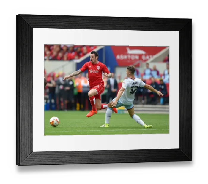 Framed Print : Bristol City vs Aston Villa: Lee Tomlin vs James Chester Clash in Championship Showdown Framed Print : Bristol City vs Aston Villa: Lee Tomlin vs James Chester Clash in Championship Showdown