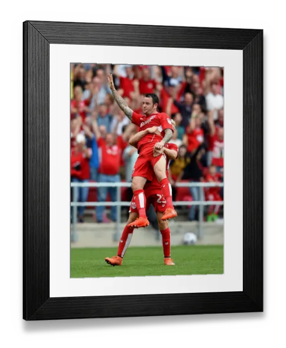 Framed Print : Bristol City's Dramatic Goal Celebration: Lee Tomlin Lifted by Hordur Magnusson vs. Aston Villa (27 August 2016) Framed Print : Bristol City's Dramatic Goal Celebration: Lee Tomlin Lifted by Hordur Magnusson vs. Aston Villa (27 August 2016)