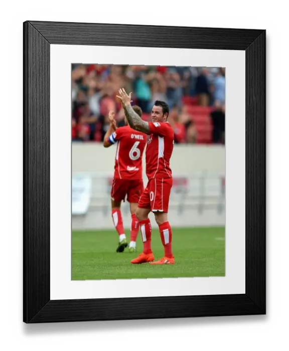 Framed Print : Bristol City's Lee Tomlin Celebrates with Fans After Win Against Aston Villa Framed Print : Bristol City's Lee Tomlin Celebrates with Fans After Win Against Aston Villa