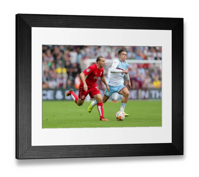 Framed Print : Bristol City vs Aston Villa: Luke Freeman vs Jack Grealish - Intense Battle at Ashton Gate Framed Print : Bristol City vs Aston Villa: Luke Freeman vs Jack Grealish - Intense Battle at Ashton Gate