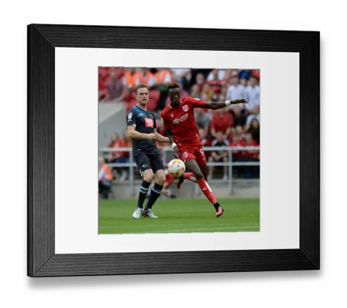 Framed Print : Abraham Chases Down Pearce: Intense Moment at Ashton Gate Framed Print : Abraham Chases Down Pearce: Intense Moment at Ashton Gate