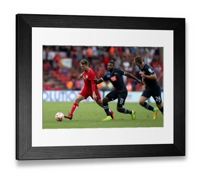 Framed Print : Bristol City's Luke Freeman Outmaneuvers Darren Bent of Derby County during Sky Bet Championship Match