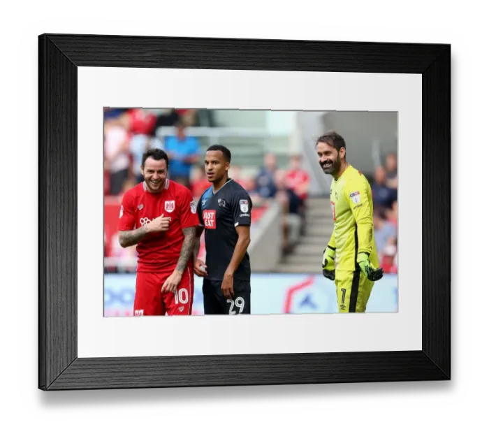 Framed Print : Bristol City vs. Derby County: A Light-Hearted Moment Between Scott Carson, Marcus Olsson, and Lee Tomlin