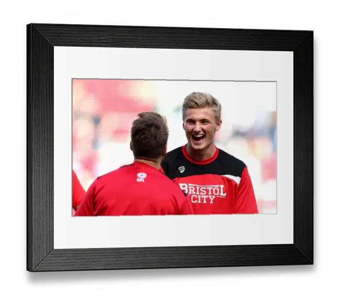Framed Print : Bristol City's Taylor Moore Grins During Warm-Up Ahead of Derby County Clash Framed Print : Bristol City's Taylor Moore Grins During Warm-Up Ahead of Derby County Clash