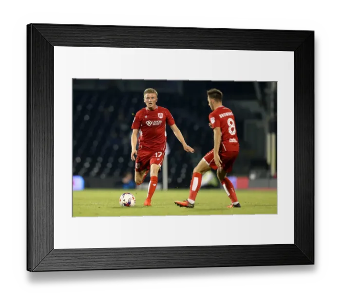 Framed Print : Bristol City's Taylor Moore Charges Forward Against Fulham in EFL Cup Clash