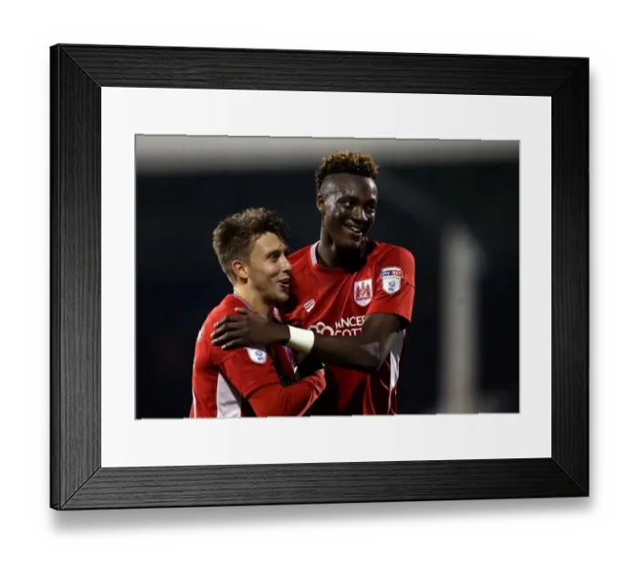 Framed Print : Bristol City's Upset Win Over Fulham in EFL Cup: Tammy Abraham and Luke Freeman Celebrate