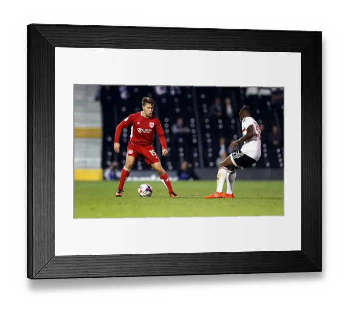 Framed Print : Freeman vs Adeniran: Battle at Craven Cottage - Fulham vs Bristol City EFL Cup Clash Framed Print : Freeman vs Adeniran: Battle at Craven Cottage - Fulham vs Bristol City EFL Cup Clash