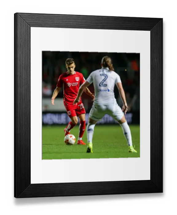 Framed Print : Bristol City vs Leeds United: Jamie Paterson vs Luke Ayling - Intense Battle at Ashton Gate