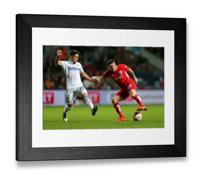 Framed Print : Intense Rivalry: Lee Tomlin vs Pablo Hernandez Battle at Ashton Gate - Bristol City vs Leeds United, Sky Bet EFL Championship Framed Print : Intense Rivalry: Lee Tomlin vs Pablo Hernandez Battle at Ashton Gate - Bristol City vs Leeds United, Sky Bet EFL Championship