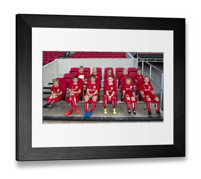 Framed Print : Bristol City Mascots in the Dugout: A Football Rivalry Unfolds at Ashton Gate Stadium