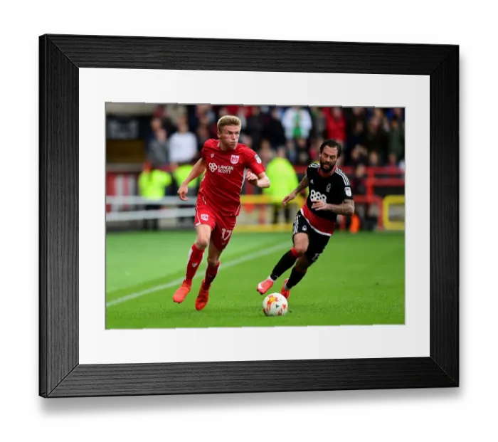 Framed Print : Bristol City's Taylor Moore Drives Forward Against Nottingham Forest in Sky Bet Championship Match Framed Print : Bristol City's Taylor Moore Drives Forward Against Nottingham Forest in Sky Bet Championship Match