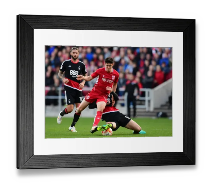 Framed Print : Intense Battle: Mills Stops O'Dowda in His Tracks - Bristol City vs. Nottingham Forest