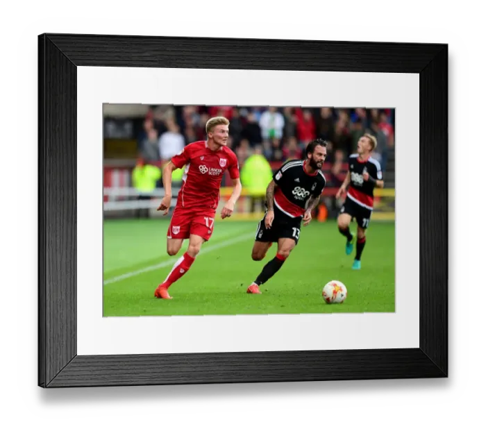 Framed Print : Taylor Moore Drives Forward in Sky Bet Championship Clash: Bristol City vs. Nottingham Forest Framed Print : Taylor Moore Drives Forward in Sky Bet Championship Clash: Bristol City vs. Nottingham Forest